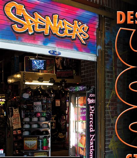 Spencer's store - Spencers Gifts carries all types of items. Clothes, jewelry, backpacks, party items and much more. The prices are like any other place like this at a mall. In the front of the store the set up is basically set up for the youth. All types of shirts and trinkets for them. On the right side of spencers is shirts on the wall and some jewelry.